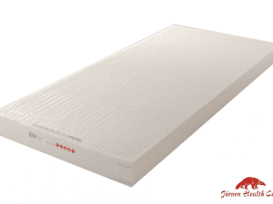 Eine Matratze mit weißen Hygienebezug aus Polyurethan. Dieser ist auf die Matratze laminiert.